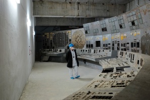 Stanislav Shekstelo, an employee of the Chernobyl Nuclear Power Plant, contemplates the remains of the Unit 4 control room.