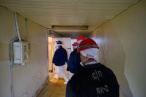 Visitors prepare to enter the Central Hall of Unit 2 at Chernobyl.